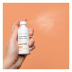 Bruma solar facial Mesoestetic lateral del envase
